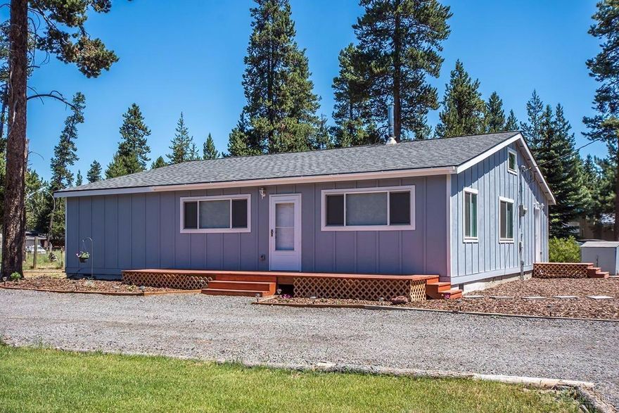 This newly remodeled 1,899 sq. ft., 3 bedroom, 2 bath + den single story home is located on a 1.04 acre lot; new roof, windows, carpet, acacia laminate flooring, Kenmore refrigerator, range/oven, dishwasher and microwave, Kinetico water filtration system and septic system; kitchen with solid raised panel red oak cabinets, laminate counters and island; living room with wood stove and new ceiling fan; master bath with single vanity and shower; 2 car detached garage; circular driveway; fully fenced; no HOA.