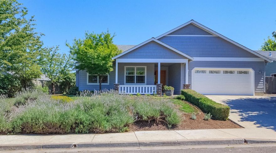 This contemporary one-story is a flexible, lifestyle home. It features a large, open great room that flows into the separate dining area. A fireplace anchors a cozy family living area. The open layout for large gatherings of family or friends. This home has a large master suite with a walk in closet and bathroom. There are two full-sized bedroomssplit floor plan. Large kitchen, granite counters, built-ins. A charming full, front porch welcomes guests. The large outdoor area can be tailored to the needs of either the low maintenance homeowner or ambitious gardener. There is covered patio off the great room. New exterior paint. beautiful, quiet neighborhood! Offers easy commutes and quick access to downtown Ashland.