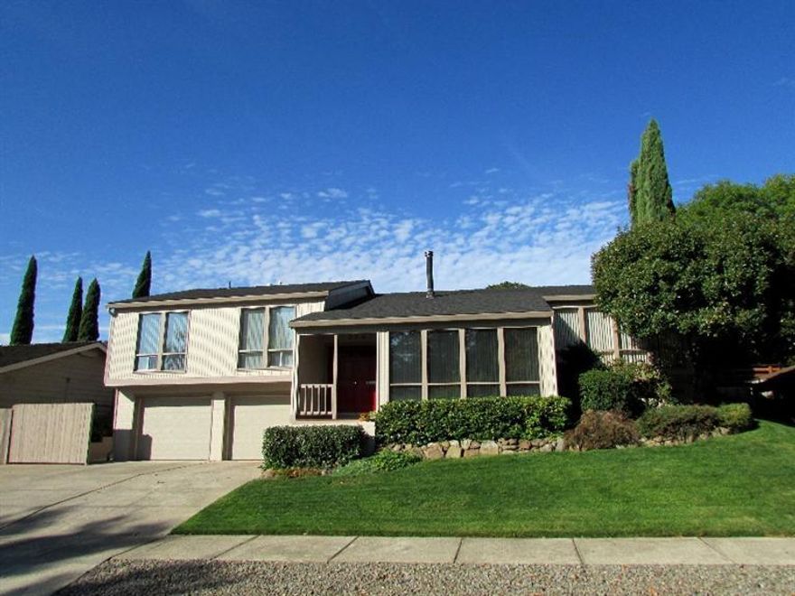 Location, location, location... this outstanding East Medford home has it all! A super desirable location close to RVMC and RVCC ~ and in the Hoover school district as well. Quiet and convenient ~ this updated home features an easy open floor plan, stunning kitchen with slab granite counters, large breakfast bar, walk-in pantry and more! Perfect for entertaining guests or a large family gathering. The slate tile floors and river rock fireplace add warmth and charm to the main level living area. The super energy-efficient wood stove adds the same to the 2nd gathering area as well. All rooms are spacious and the baths are gorgeous ~custom tile and granite are displayed throughout! The grounds are picture perfect with an inviting in-ground pool, well planned landscaping, R.V. sized side parking and more! (You have no back neighbors) Holmes Park's walking trails are directly behind you! The 2-car garage even features an interior shop! This won't last long ~ take a tour today!