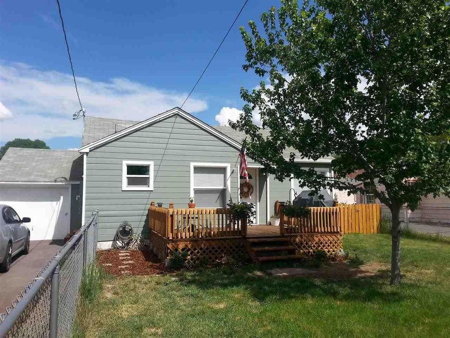 Super Cute! Just About Everything You Can Think Of Has Been Updated Or Redone In This Cute Little House! Brand New Kitchen Including Cabinets And Appliances. New Flooring Throughout. Completely Remodled Bathroom With New Shower And Vanity. Fresh Paint Thoughout Interior And Exterior! Front Yard Is Fenced With A Small Deck Off The Front Door. Huge Back Yard With Approx .28 Of An Acre To Build A Shop If You So Desire. The Same Family Owns The Adjacent Property That Will Be On The Market Soon Also.A Fence To Seperate The Two Properties May Be Negotiable. Stackable Washer And Dryer Are Negotiable Also. Adjacent Property Could Be Bought As A Package. Live In One And Rent Out The Other.... You Have Got To See This One To Appreciate!