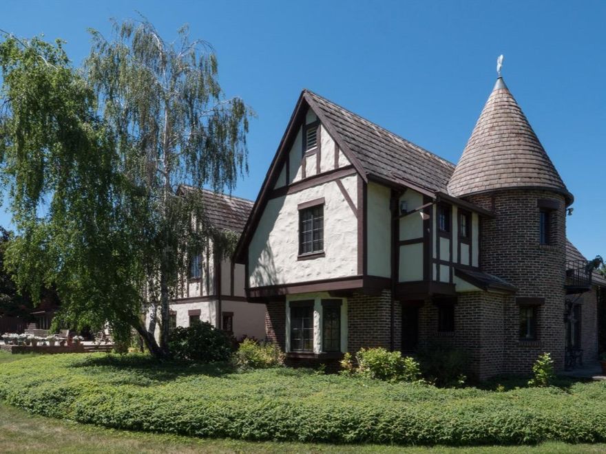 Fabulous English tudor designed by Frank C Clark with classic lines and character. Perfect for an avid equestrian or a potential vineyard. Water rights provided by MID. In-ground 20X40 saline pool. Detached guest quarters/artist studio, multi-stall barn plus a pole barn. Gourmet kitchen featuring Sub-Zero and Thermador. Beautiful living room with 17 foot beamed ceiling and hardwood floors. This is one of the Rogue Valley's most majestic homes. A must see!