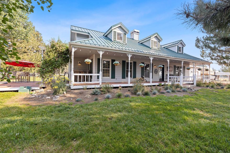 This property is a delightful 5± acre equestrian estate near Tumalo and just six miles from Bend. Known for breeding and training top horses in NRCHA, Team Penning, and Sorting competitions, it features a two-story home with three bedrooms and two bathrooms across 2,080± square feet. Highlights include wood-burning stone fireplaces, a wrap-around porch, a 20' x 24' deck, and a permit-ready plan for an expanded primary suite. The property also boasts a 24' x 36' barn, a 10' x 36' equipment shed, and a 12' x 24' run-in shed, all set in a mature landscape with stunning mountain views. Located on a cul-de-sac, Juliet Farm offers a peaceful retreat just 6± minutes from Bend, with easy access to shopping, dining, and skiing at Mount Bachelor. Experience a perfect blend of elegant living and equestrian excellence at this exceptional estate.