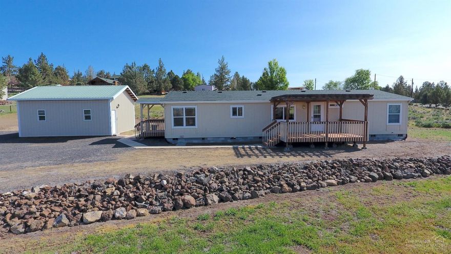 Gorgeous views of the Cascades from this immaculate 3b /2b 1539 sq. ft. home on .99 acres. Property is on a paved and quiet road. Updated kitchen in the last 6 years with oak cabinets, 2 Lazy Susan's and lots of cupboard space. Heat pump with forced air to keep you cozy in the winter and cool in the summer. Separated master suite for privacy. 2 car detached garage with work benches and garage door opener. Newly sanded and stained porches/decks newer exterior and interior paint. Move in ready. Explore the Deschutes river canyon with miles of trails and premier fly fishing just steps away. Check out Crooked River Ranch and all it has to offer. Golf, swimming, community activities, tennis, pickleball, disc golf, parks, hiking, fishing, and more.