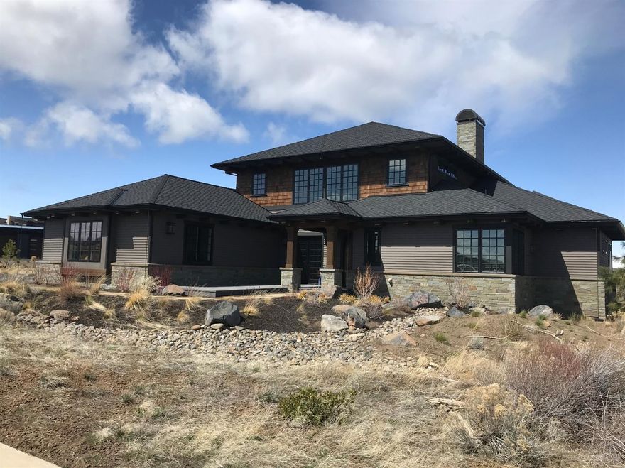 Beautiful home built by Pacwest Homes. This one of a kind home is on the 7th green of the golf course with gorgeous Cascade Mtn views and surrounded on 3 sides by golf course property. In ground swim spa with deck and privacy enclosure. Main floor master with adjoining study and fireplace. 1 more en suite bedroom down with 2 en suite bedrooms up with viewing decks. Gourmet kitchen w/quartz counters and island. This home includes full golf membership.