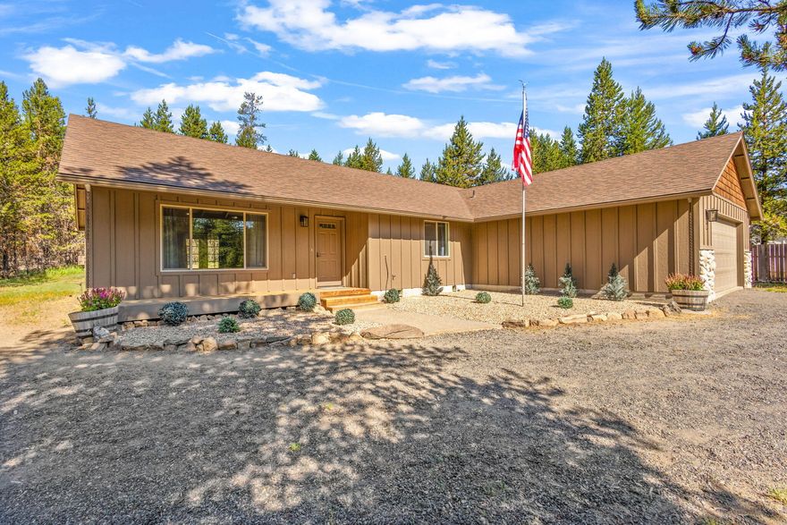 Nestled on 1.05 acres in the desirable Woodland Park subdivision, this 3 bed, 2 bath home offers 1,686 SqFt of peaceful living just 30 minutes from Bend, OR. Located on a private, fenced, and gated corner lot surrounded by native trees, this property is perfect for those seeking space and serenity. Relax in the backyard hot tub or stay cozy by the gas fireplace. Inside, enjoy thoughtful upgrades including a central vacuum system, water softener, and a newer roof. The spacious layout provides comfort and functionality, while the privacy and natural setting make it truly one of a kind. Just minutes from the local corner store, this gem combines convenience with a country feel. Don't miss your chance to own a slice of Central Oregon tranquility!