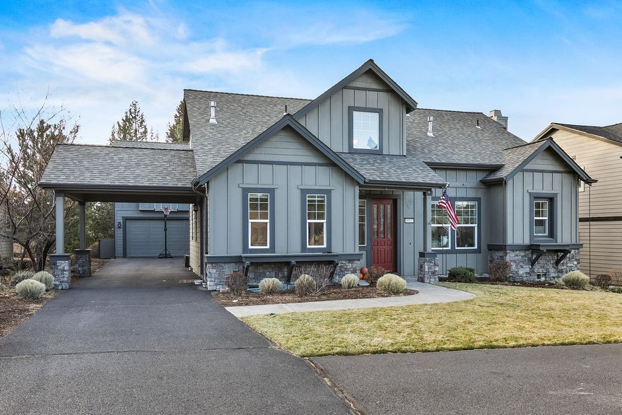 Impressive remodel with a recent addition make this lovely home in the Parks one you'll not want to miss.  The open floor plan has been overhauled with designer touches including wide plank hardwood floors, exposed beams, ship lap accents and new lighting. The kitchen is the hub of the floor plan with access to the dining area, great room and mudroom off the carport. There is a large paver patio accessed from the great room with views of the Cascades from the hot tub while the main level primary suite has a jetted tub, double vanity and walk in closet. Upstairs the addition boasts a new large bonus room, deck and laundry area, three bedrooms and a full bath.  Fresh paint throughout with a main level home office or flex room. Outside is a detached two car garage with a versatile studio suite above. The home is centrally located to schools, trails, & Mt. Bachelor. At the same time, the specific location is on a quiet street close to the neighborhood parks and the private community pool.