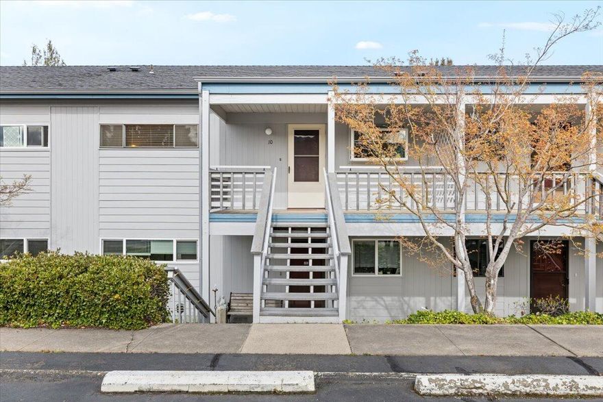 Quiet Upstairs Condo with spectacular views. Oak Knoll Golf course is right around the corner. Remodeled with beautiful new Hickory Style Flooring, all new stainless steel kitchen appliances, waterfall sink, butcher block countertops, and garden window. The bathroom is updated with double sinks, walk-in shower and newer washer and dryer. Water heater is also new. Off of the private 200 sq. ft. balcony is a storage area with workbench, pegboard, shelves and power_ The covered carport has additional storage cabinets. HOA covers water, sewer, garbage, landscaping and all exterior maintenance. All new plumbing and exterior paint just completed, and there are community raised garden beds for you to enjoy. Don't miss this rare opportunity to own an incredible condo close to shopping and recreational activities in a desired neighborhood.