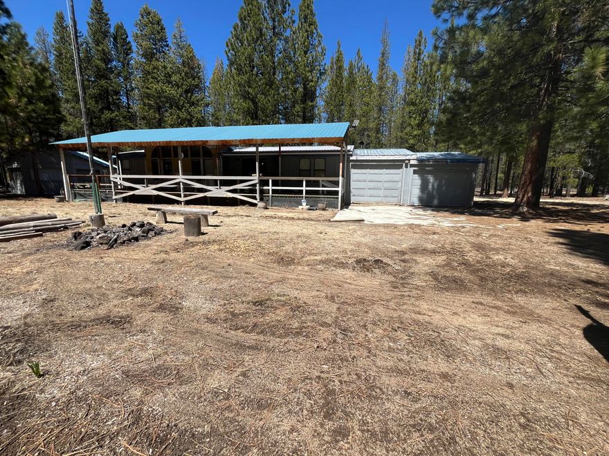 PRICE IMPROVMEMT!! Private 2 bedroom 2 bath home located on 5 acres in Schoonover.  Home has open floor plan, a large living room and a covered front deck.  Attached is two separate one car garages as well as a 30x40 detached Shop.  Property has a heated bunk house for guest or storage and an old A-Frame that is in need of repairs.  The home will include furniture and some tools.  Great Area to get away for the weekend and bring your Snowmobiles and four wheelers.  Home has a brand new 1750-gallon cistern for water supply.