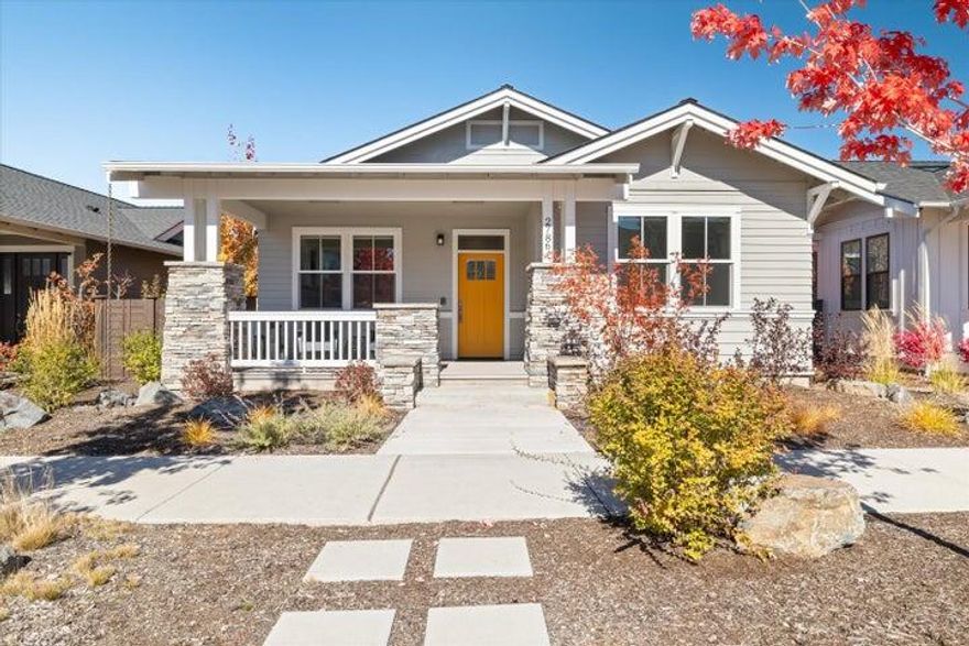 Welcome to this pristine single-level contemporary craftsman home - both warm and inviting, yet modern and chic. Just a mere two houses away from the amenities of Discovery Park, you'll love living in the heart of Northwest Crossing! Whether you're entertaining or simply living day to day, it's clear you'll enjoy how light and bright the home truly is. A skylight and large windows invite natural light to spill in and grace the home with its warmth. Home chefs will appreciate the stainless-steel appliances, environmentally friendly induction range, custom oven hood, and large solid surface island. The low maintenance landscaping gives off a natural feel, without requiring endless hours of care. The garage has epoxy finished floors and plenty of built-in cabinetry to store all your belongings. If you're seeking an ideal location within Bend, Oregon, this is it! Don't miss your chance to make this home yours today.