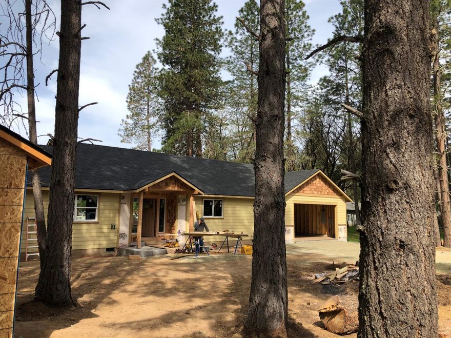 This soon to be completed Custom Home is located in a beautifully wooded cult-a-sac with community-deeded access to the Rogue River. Home will include upgraded cabinets, granite counter-tops, large open family/entertainment room, generously sized master suite with a walk-in closet, vaulted ceilings, covered wood deck and two car garage. Home is currently under construction, so now is the time to customize your paint colors, flooring, landscaping and other finishing touches. The seller/builder is offering a $10,000 credit for fixtures, upgrades and/or closing costs if accepted offer prior to completion.