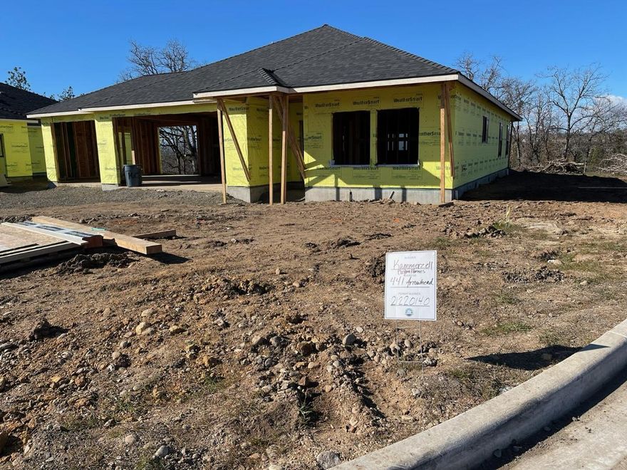 Est. to be completed June of 2022. Prepare to be blown away once you walk in the large entry to this 3B/2B + office 1893 sq ft home. The spacious floor plan with 9' ceilings, laminate flooring throughout and Black Anderson windows is an entertainer's dream home. The marvelous kitchen includes a center island and stone countertops, a full-sized farm front kitchen sink, gas range/oven combo with hood, a dishwasher, and a sizable pantry. The master bedroom has dual walk-in closets, tile shower and a free-standing soaker tub. The finished 3 car garage offers extra room for parking or storage.  The front & back yards are landscaped with grass & bark. This home is new construction, amenities and specs may change without notice. HOA Dues are $88/Qtr. *Rendering is for house style  only. It does not represent landscape detail or exterior color.