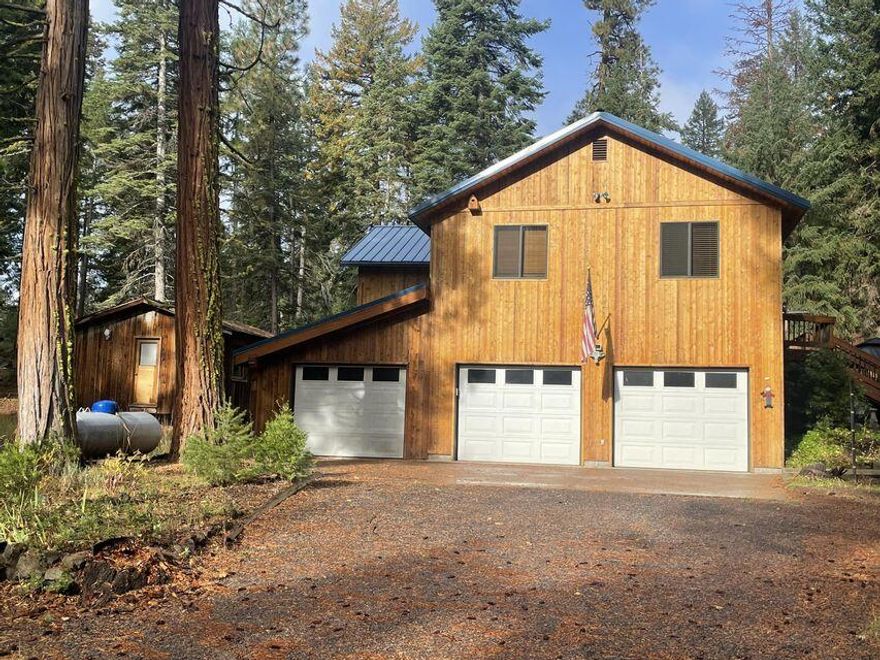 Come check out this wonderful property in the woods at Rocky point! This wonderful property is close to the Rocky Point Resort and Lake of The Woods Resort as well as the Crater Lake Zip Line! The home is equipped with a Generac backup generator and Electric chair lift to get you upstairs, if need be, there is an old rustic cabin that could be refurbished and used for anything you would like, the home has a three bay garage for lots of storage and working on equipment! There is deer horn chandeliers in the interior and the home comes completely furnished.