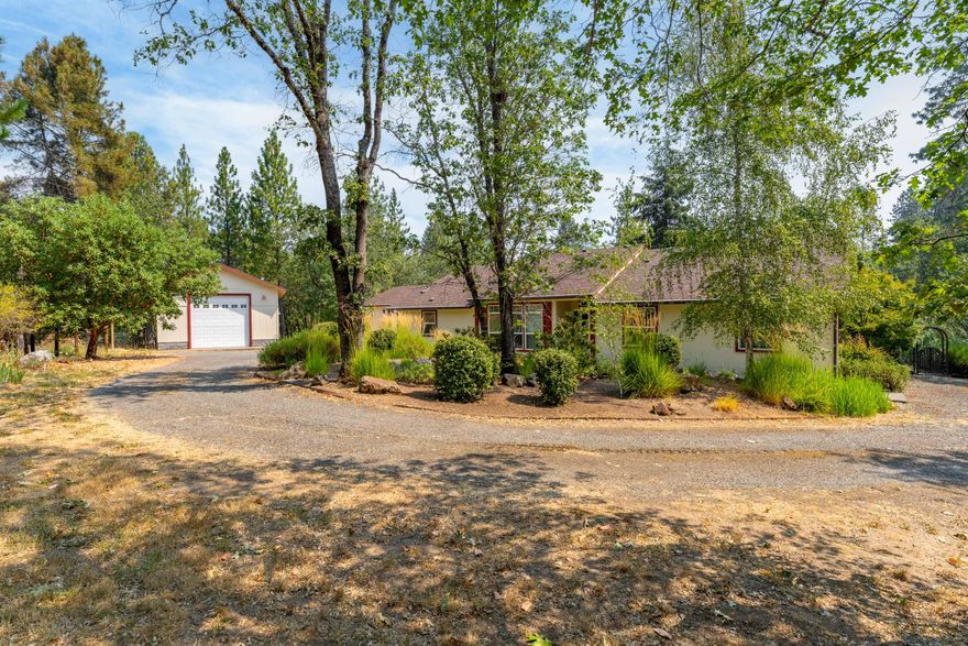 First time offered! Very close to all services.....Little bit of country and a whole lot of fabulous living. This single level, large, just under 3000 sf home, built in 2005, is bright and sunny and a dream come true - formal liv room, chef's kitchen with island, tons of storage, Thermador 6 burner range, wall oven & dishwasher, stainless appliances, walk-in pantry, mudroom w/half bath. Kitchen opens to welcoming family room; both overlook the flat usable acreage and outdoor entertaining space w/gazebo, built-in barbecue and pizza oven! Interior also offers two bedrooms plus office & full bath. Separated from the Primary suite with updated handicap access shower. Landscaped to perfection. RV barn/shop for the hobbyist. Extra boat/RV coverage and detached 2+ car garage all on 2.38 acres. Gated, serene and waiting for you!