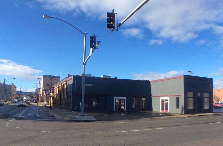 Prime visibility corner location at lighted intersection in downtown Medford. Easy access and parking along a main thoroughfare into town. Adjacent to Rogue Community College and easy walking distance to all nearby businesses and attractions. High volume pedestrian and vehicle traffic counts. Attractive 1,944 sqft single story building with approximately 1,000 sqft basement area. Two entries into recently updated spaces with big showroom windows. Easy to reconfigure floor plan to meet your needs. Two bathrooms and smaller office area. Zoned Community Commercial (C-C) allowing for dozens of permitted uses - without the restrictive parking requirements. Large public parking lot next door. Owner terms may be available.