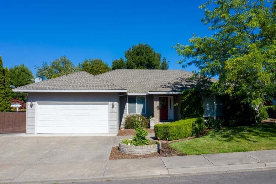 Incredible East Medford Location and Home! Tons of upgrades and extras throughout - Hardwood floors have been newly refinished. Bedrooms boast new carpets. Spacious Kitchen offers new granite counters and plenty of storage. Formal Dining Room is the perfect space for your get-togethers. Relax in the Family Room next to the gas fireplace then open the French doors to a semi-covered patio and fully fenced back yard. Fantastic master suite with double doors, and Seller has replaced the sinks in both baths and the kitchen as well. Nice-sized Laundry Room. Newly painted. Huge RV parking and attached two car garage. Lone Pine Elementary School area makes this home & location highly-desirable. Bring your clients today, they will love it.