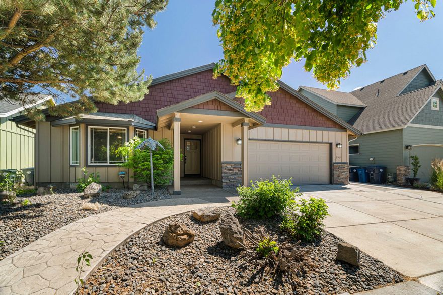 Spacious & well-designed, this ranch-style home lives large with vaulted ceilings, abundant light & open-concept living. The great room features a gas fireplace & flows into a gourmet kitchen with island, stainless appliances, solid-surface counters, tile backsplash & pantry. Private primary suite offers vaulted ceilings, double vanity & walk-in closet. Upgrades include fresh paint, hardwoods, solar tubes, A/C & forced air. Fully fenced, low-maintenance yard has turf, patio, sprinklers & drip system. Located on a quiet cul-de-sac near parks, trails & top-rated schools.