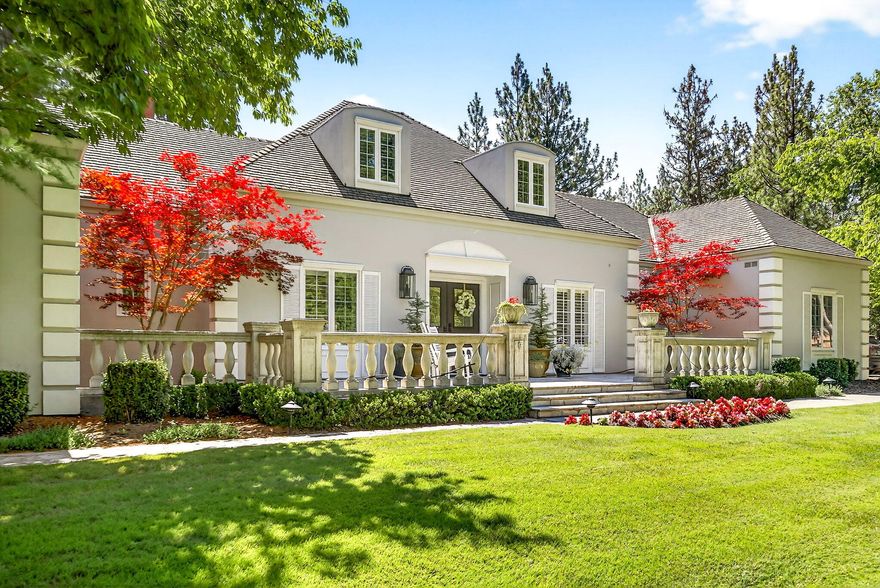 Timeless contemporary ranch with 4 bedrooms and 2.5 baths on nearly 6 private acres served by a 17 GPM well. A tree lined private drive creates a grand entrance to this impeccably maintained estate with service records current on all systems. Features include granite counters, custom built-ins, hardwood and tile floors, and an expansive primary suite spanning the entire second level. The chef's kitchen offers a 36 inch Wolf gas cooktop, stainless KitchenAid appliances, an oversized island, and a generous eating bar. Enjoy the heated oversized 3 car garage with backup generator, a large swimming pool with retractable cover in a private courtyard, and a new Prodigy saltwater spa installed in 2025. The grounds showcase mature landscaping, a pond, water rights, flexible fencing and cross-fencing, plus high speed internet. Many furnishings and inclusions negotiable with an acceptable offer. Pre-inspections of the home, well, and septic were completed in early 2025 for peace of mind.