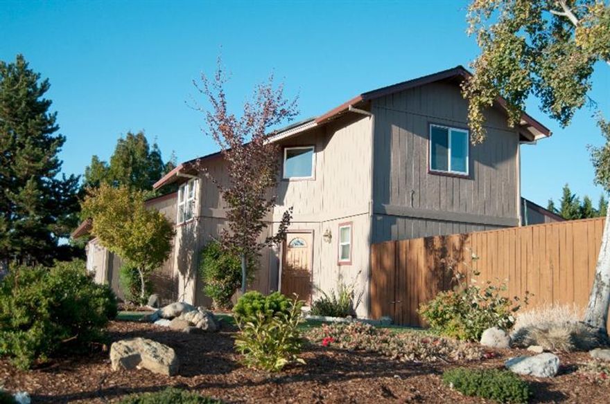 This Two-Story Home shows Pride of Ownership throughout. Located on a corner lot in Central Point, this home features 3 bedrooms, 2 bathrooms, 1512 sq. ft., and sits on a usable .18 acre lot. Since 2010, upgrades such as new carpeting (2010), new windows (2013), new heat pump (2013), and new kitchen & bathroom vinyl flooring (2013) have made this home into a buyer's dream at an affordable price. Backyard area consists of both garden and storage sheds, gated RV space, automatic sprinklers, raised garden beds, and is surrounded by a newly stained fence. Special Top-down bottom-up blinds are included with home as well. Views of the Mountains from the Master Bedroom will make you feel right at home. Come by and view this beauty before it's too late!!