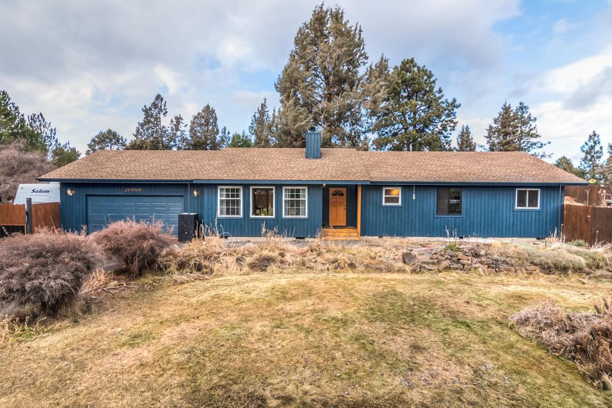 Welcome Home to this lovely updated 3 bedroom 2 bath, single story, ranch home in desirable Desert Woods in SE Bend, Oregon. Large .46 acre lot with RV parking, native landscaping, large storage shed, duck coop and rabbit hutch, raised garden beds and room for more. New flooring, vaulted ceilings in great room, wood burning stove, updated bath and kitchen and new exterior paint makes this home move in ready. 2 car attached garage with plenty of storage, interior laundry with utility sink, master bedroom with space for a home office, master bath with shower featuring natural stone tile and dual shower heads and lots of natural light from 2 custom rock tiled skylights. Come take a look! 3-50 gallon rain barrels (150 gallons total) set up for watering and irrigation. Ducks may be included outside of escrow.