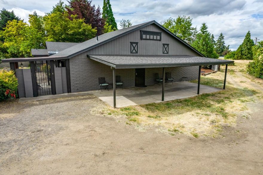 This spectacular, contemporary, charmer boasts many recent updates throughout, and is located on a huge .93 (almost full acre) lot. Three large bedrooms, three full bathrooms, large open living room plus family room, large yard with lots of gorgeous landscaping and mature trees, inside laundry room, huge detached shop, plenty of room for additional parking, and so much more. There are so many recent upgrades and extras we couldn't list them all; including updated kitchen, stainless steel appliances, new air conditioning system, newer roof, newer paint, new carpet, new flooring, newer lighting and more. Just one minute away from Costco. Don't miss this incredible opportunity to own a country property tucked away on a very private lot just minutes to town. One owner is a licensed realtor in the state of Oregon.