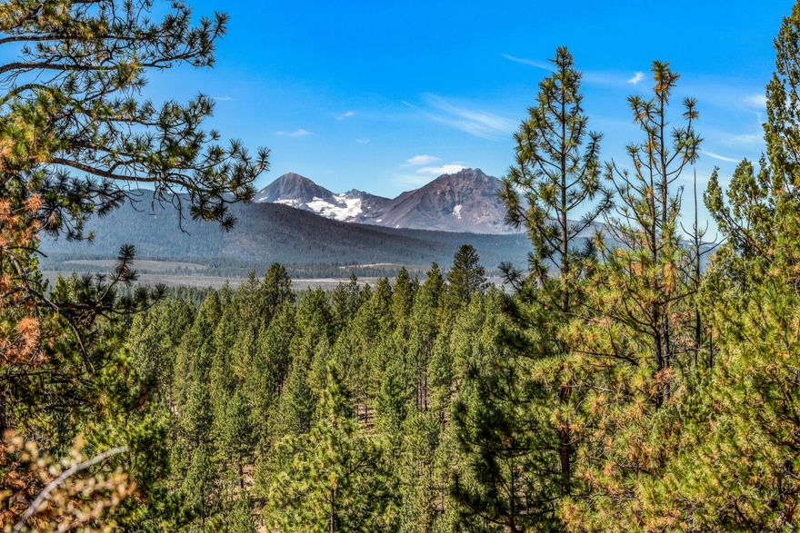 Nestled in the desirable Skyline Ranch neighborhood, this lot provides the perfect blend of privacy and convenience, allowing you to enjoy the tranquility of country living, with breathtaking Cascade views, while still being close to town amenities. Here is your opportunity to realize your dream home on 2.5 acres of highly sought-after west side land. Additionally, the proximity to Shevlin Park offers endless opportunities for outdoor activities, whether it's splashing around with your kids in the creek or leisurely outings with your furry friend. Don't miss out on this incredible chance to create your own oasis in this idyllic location.