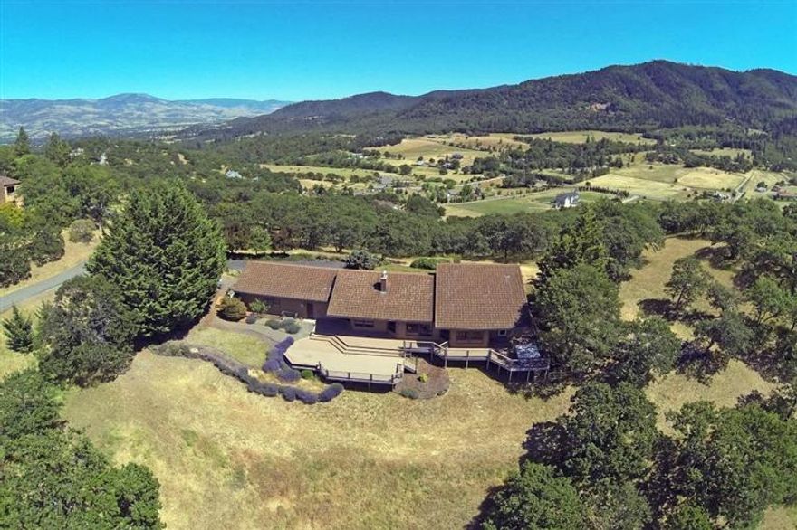 Stunning views from every vantage point of this beautiful property. Located the Pioneer Hills rural subdivision just minutes from both Medford and Ashland. The lovely, single level home has a nice open floor plan. The spacious living room and dining room are separated by a floor to ceiling, brick fireplace open to both rooms. There are also vaulted, cedar-lined ceilings and walls of windows that bring the whole valley into view. The open kitchen with the island breakfast bar is an inviting place for family and friends to gather. Just off the open living room is a great office/library with built in shelves and cozy window seats. The master bedroom also has panoramic views of the valley as well as a nice master bath with double sinks and a door leading out to the deck and hot tub. Speaking of decks! A great place to relax and take in the nature that surrounds you. This is a fabulous property with serenity and privacy yet close to town.