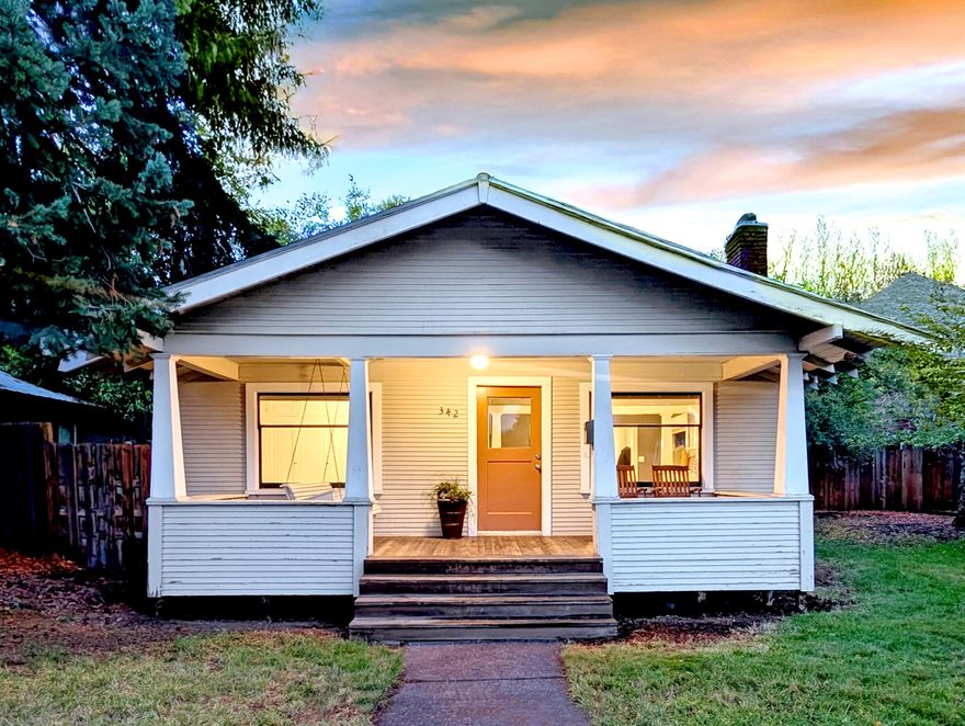 Welcome to this delightful 1925 bungalow, a blend of historic charm and contemporary living. 1,108 square feet offers two bedrooms and one bathroom providing a welcoming retreat for anyone seeking character and comfort. The living room features a striking fireplace that adds warmth and style while the larger bedroom offers a walk-in closet with abundant storage. Throughout, there are original touches that capture the essence of this home's era. Start your day on the covered porch swing and then enjoy the spacious backyard for evening gardening or gathering with friends. Alley access to parking and a detached shop offers convenience and development opportunity. Nestled in the heart of Bend's Historic district, this bungalow provides easy access to downtown, shopping, dining and the Deschutes River, while also offering a peaceful neighborhood vibe. Add your personal touches and make this charming home your own.