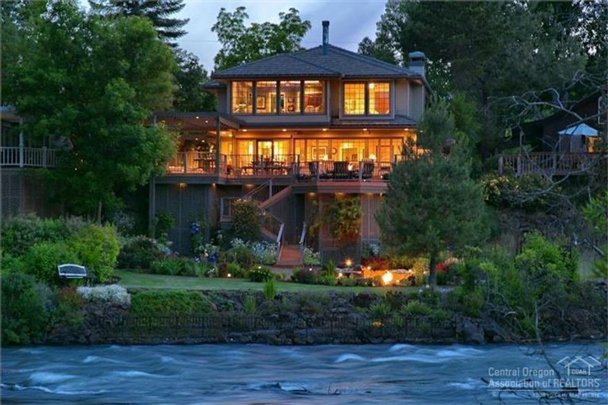 Truly a one of a kind setting & location just blocks from downtown Bend. Views of the Deschutes River greet you the moment you walk in this impressive 4 BR, 3.5 BA home. Incredible mature landscaping surrounds this home, creating a private park like setting in front of the 1st St Rapids. Features an open flowing floor plan, chef's kitchen, bonus room, addit'l 864 sq ft detached shop/garage, & more. Enjoy the peaceful sounds of the river & amazing views from a large deck & multiple outdoor sitting areas.