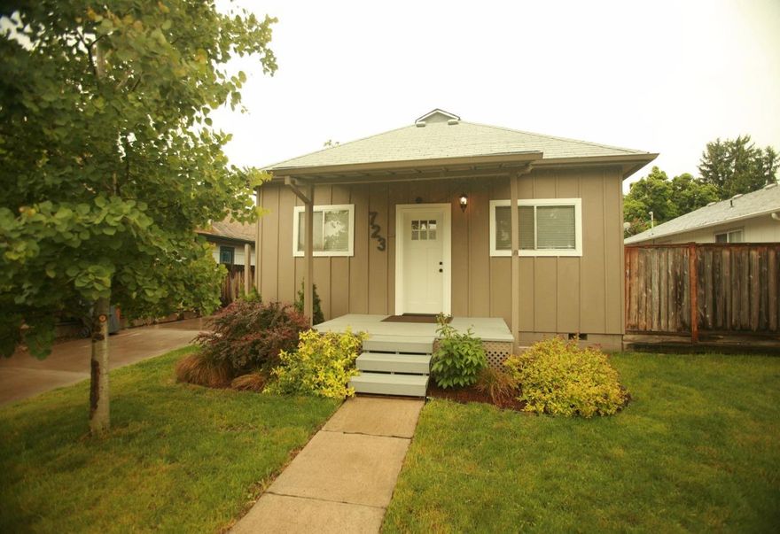 Updated 2bed 1 Bath Craftsman with great curb appeal that you can be proud to call your own. Great open floor plan with lots of natural light, which makes this home feel big and roomy. Kitchen has just received new counter tops with classic subway tile backsplash and durable laminate floors continue into the living room. Interior paint throughout with new carpets, and doors in the bedrooms too. Bathroom is a great space with custom tile floors and unique barn door. The back yard has plenty of room for kids and pets to play with a nice mix of grass and patio space. The back yard also has a finished storage shed/shop that has been used as an office in the past. Home also offers off street/RV parking, and alley access.