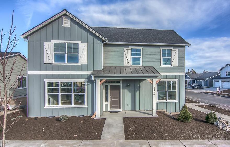 You will love this stunning modern farmhouse style home on a corner lot in the Northpointe neighborhood. This home features a beautiful kitchen with custom cabinets, stainless appliances, a large breakfast bar and corner pantry. The hardwood flooring, 9' ceilings, and gas fireplace add to the warm comfortable feel. You will also find an office on the main level along with a 3-car garage, covered back patio and front porch. This home is Earth Advantage certified and includes a 2-10 Buyers Warranty.