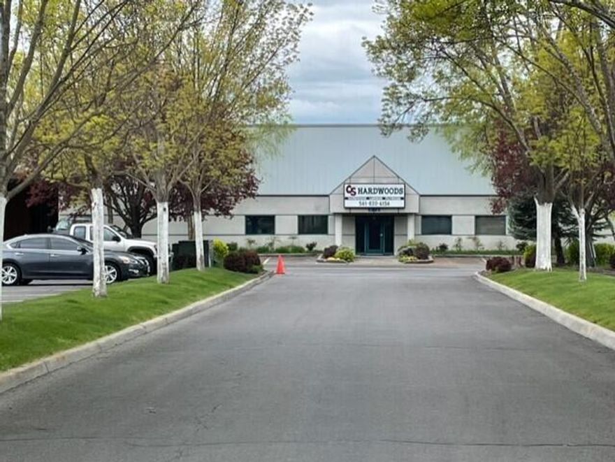 Light Industrial Building located in an attractive Industrial Center.  The space has a private office and is ideal for manufacturing or distribution with open span steel construction.  19' to 23' ceiling height, 12 x 14' roll up doors, insulated, roof top gas heat with central air conditioning.  Building is located on 1.58 acres and has a large fenced rear yard for security with ample storage or parking.  The available space is 11,800 sq.ft. but can be increased.  Large  covered area at the rear exterior of the building.  The base rent is $ ,70/sq.ft. with an additional amount for CAM charges.  Space has 800 AMPS 3 Phase 440V.