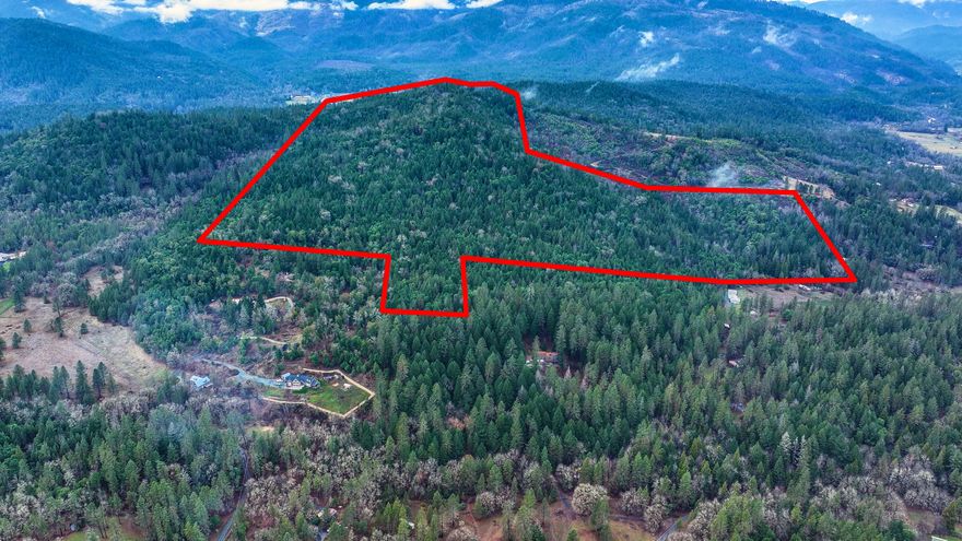 Two parcels totaling, approxmately, 124 acres located about two miles east of Merlin. Timbered with old road grades in place. NOTE: The property does not have legal access and may not be viewed from
Abegg Road without trespassing. There is BLM land, adjacent to the west which fronts the Rogue River. However, topography is steep and there are no known roads coming in from that route. It is possilbe that there are trails which access the property from this direction but buyer must verify. The eastern parcel is
split such that a small portion approximately 0.04 acres) lies 1300+/- feet to the east. Legal lot status would need to be verified with the county. If the access could be perfected, this property could make for a wonderful, recreational retreat, potenail homesite and timber investment property.