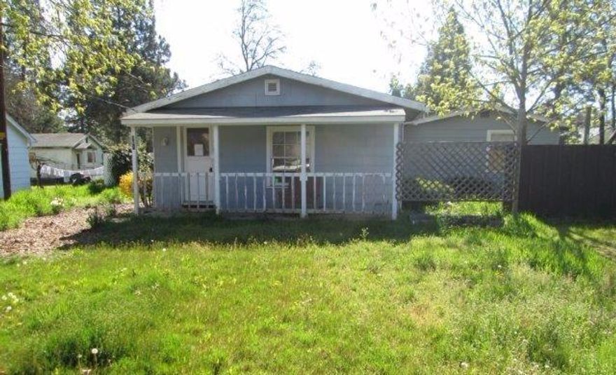 Large two-bedroom, 1 bath home on huge lot (almost 0.25 acres!) in Phoenix. Cute front porch, big yard, mature trees, shed in the backyard, and indoor washer and dryer hookups. It's a fixer, but with some TLC, this could be a great home!!!