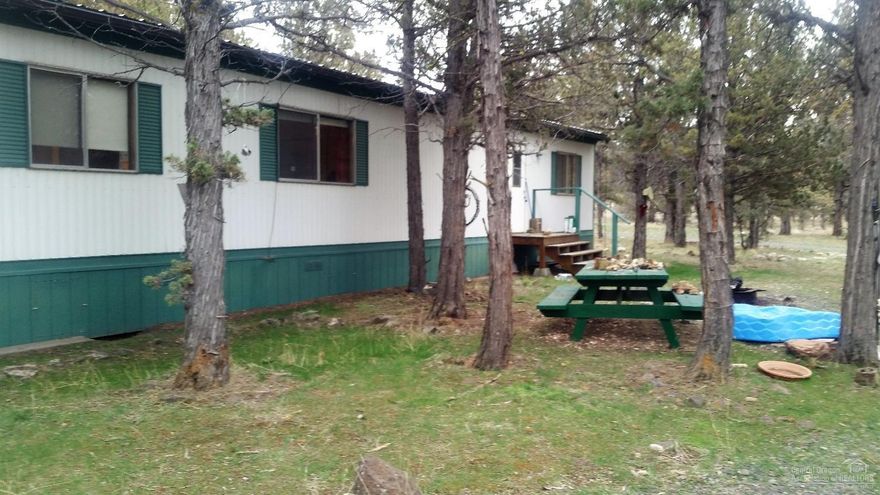 Peaceful little setting on 1.95 acres. 2 bed, 1 bath single wide home with storage shed. Great place to live or use as a vacation get away. Lots of room for boat, atv's and more. Prineville reservoir only minutes away.