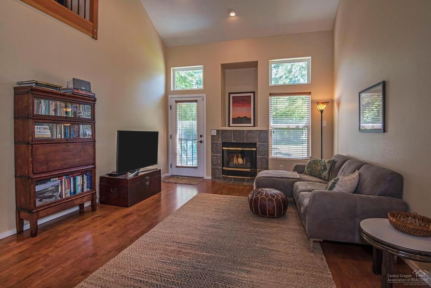 Original model home with over $50,000 in upgrades. Fresh interior paint, loft has all upgraded railing. Remodeled kitchen. Remodeled baths. Newer counter tops and hardware. Beautiful flooring. Epoxy floor in garage. One of the nicest units in Boulder Brook.