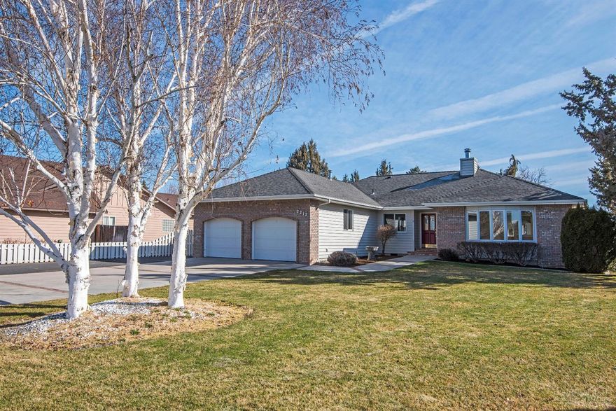 Desirable NW Canyon locations. Lovely .35 acre landscaped lot, fully fenced, with ADU potential*. This beautiful home offers 3 bedroom, 2 baths, large kitchen-family room with gas fireplace. Kitchen features solid surface countertops, newer appliances, loads of cabinets and storage. Wonderful wrap-around decking and gorgeous lawn for outdoor living and entertaining. RV parking with hookups. Two separate hobby/storage sheds, both with power.