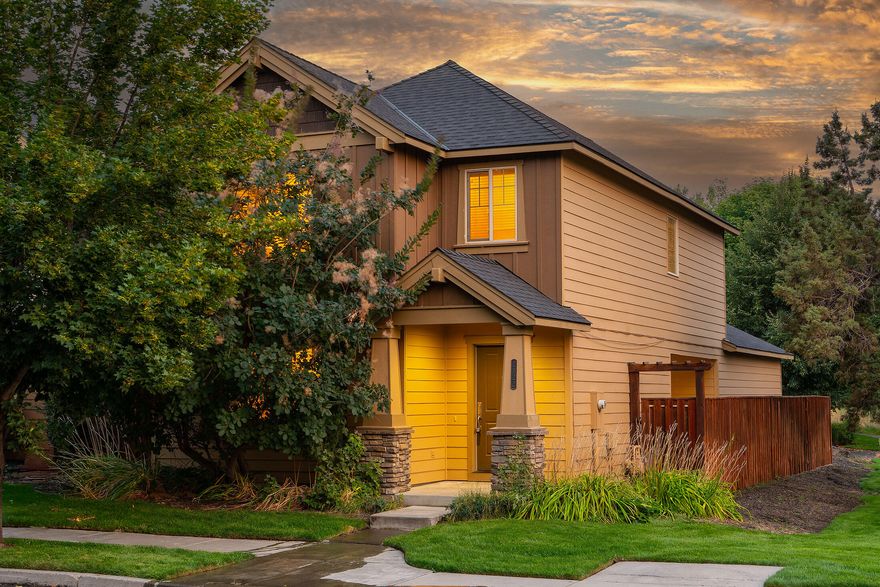 Lovely home located in the Fieldstone Crossing neighborhood nestled in a park like setting next to a maintained green space, trail and canal! Enjoy the privacy without the yard work and more free time to enjoy all that Central Oregon has to offer. Inside, an open floor plan on the main level that offers a raised breakfast bar between kitchen and dining area and a cozy corner set gas fireplace in the living room. Newer carpet installed downstairs in 2022. Gated, private side patio ready for a BBQ setup or a beautiful potted garden area. The upstairs primary bedroom has peek-a-boo mountain views! Two additional bedrooms, a nice linen closet and another full bathroom. Roof replaced in 2017. Pool access and a park located right of the back alleyway! This would make a great investment property or perfect for a first time home buyer! Turnkey and in great condition! Schedule a tour today!