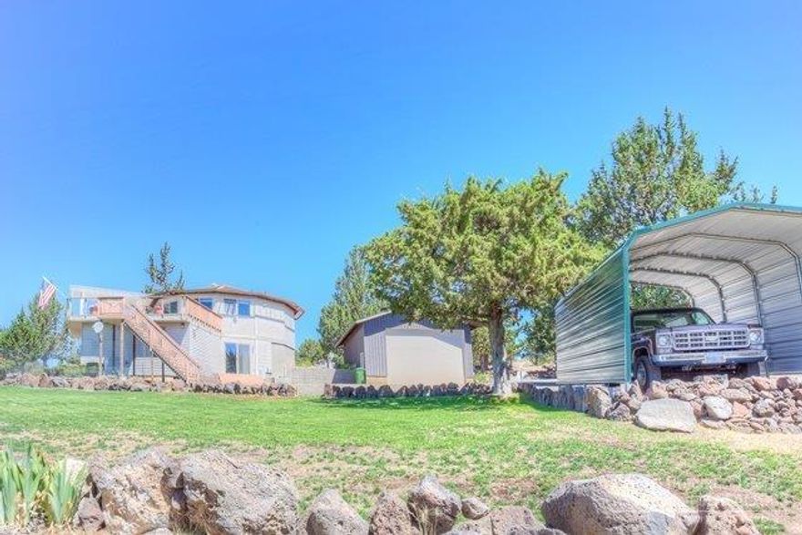 Are you looking for something special? With an amazing mountain & farmland view, surrounded by peace & quiet? And only minutes to the boat dock? This one owner, custom designed 2 level home features an open concept floor plan with views in every direction, a large deck for entertaining, updated kitchen, large master suite with sitting area and plenty of storage space. 24 x 32 RV/Shop/Garage with 12' overhead door and a separate covered parking pad. Weekends or weeks-on-end this home is sure to delight.