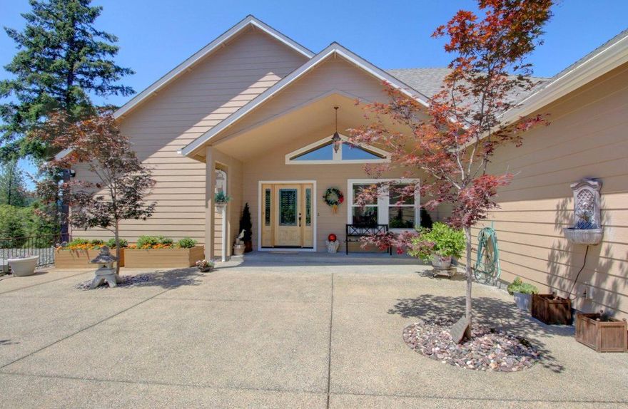 Views from The Top of the World! These 360 degree amazing views tell you this property is all Oregon! Nothing was missed when designing the perfect interior of this home. Enter to the spacious and bright formal living area and dining room with hardwood floors, vaulted ceilings and large windows that take you to the view. Same main floor is home to the master bedroom with ceiling fan, very large walk in closet, more views and a door to the covered back deck. The master bathroom has heated travertine floors, jetted tub with motorized window shade and separate walk in tile shower. Heading to the kitchen we have granite counters with lots of space, double oven, pantry, breakfast nook and a door out to enjoy the back deck and perfect access for the BBQ. Off the kitchen is the relaxing second living area with propane fireplace, more views and the second and third bedrooms nearby. Not only is this home gorgeous, but it basically all single level living until you head down to the 900 Sq Ft day