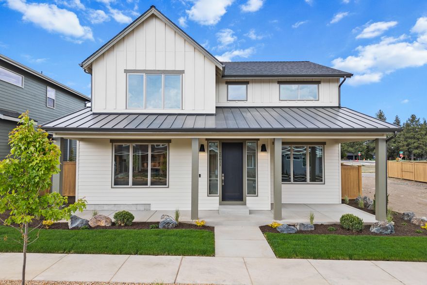 Welcome to this thoughtfully designed farmhouse-style home in Countryside by Stone Bridges Homes NW. Featuring a spacious two-story layout and an alley-load 3-car tandem garage, this home offers both style and functionality. The open-concept main level includes a cozy gas fireplace, a kitchen with a central island, and pantry. Enjoy outdoor living with a backyard patio off the kitchen. A main-level 4th bedroom or den provides flexibility, complemented by a full bath with a tile shower. Upstairs, the primary suite offers an ensuite with dual vanities, large tile shower, and walk-in closet. Two additional bedrooms and a full bath with dual vanities complete the upper level, along with a convenient utility room. Experience the perfect blend of design and comfort—make this home yours today!