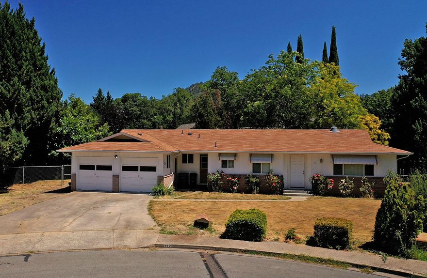 Enjoy quiet cul de sac living with this cute, clean, single story home with large fenced backyard in beautiful Rogue River! Just minutes to town and freeway this 2 bedroom/2 bath home also includes an office that can be used as 3rd bedroom, crafts, and more! 2 car garage, open concept kitchen and recent home inspection make this home a great opportunity for downsizers, 1st time homebuyers, and investors! Appointment only but easy to show. Available online: drone aerial exterior video, 3D Matterport interior video, floorplan, measurements, home inspection. Do not disturb occupants.