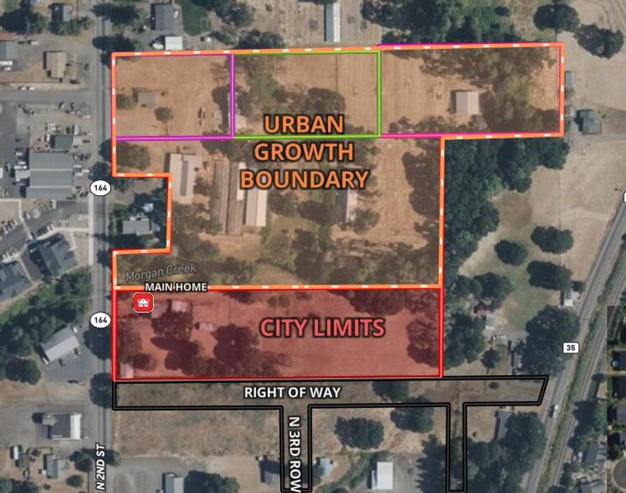 14.7-acre development opportunity in Jefferson, Oregon, with 3.49 acres inside city limits and approximately 11 acres within the Urban Growth Boundary. The southern boundary fronts a full street right-of-way, enhancing access and layout potential. Zoned MU-Highway, allowing for a wide range of uses including high-density residential and commercial. The property includes 2 homes and multiple shops, offering potential for separate sale and added investment upside.