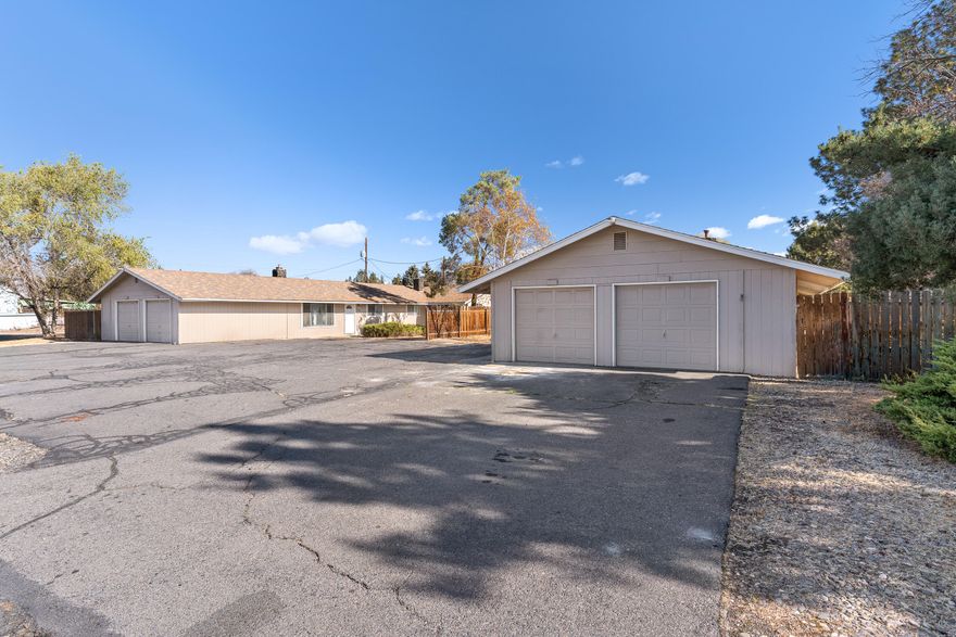 Prime Investment Opportunity! Two single-level duplexes with nearly 20 years of solid rental history, situated on a generous half-acre across two tax lots. Each duplex boasts a spacious 1,899 sq. ft. layout, featuring one 3-bedroom, 2-bath unit and one 2-bedroom, 1-bath unit, offering flexibility and appeal for a variety of tenants. Enjoy cozy fireplaces, open dining areas, functional kitchens, and convenient laundry/utility rooms in all units. Each unit also includes a fully fenced, sizable yard for outdoor enjoyment and a single-car garage. This is a rare chance to secure a stable income property in a great location. Don't miss out on this excellent investment!