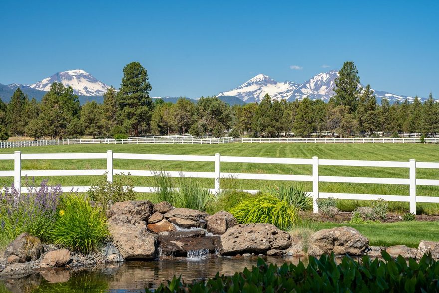 This stunning Home is situated on one of the most sought after roads in Tumalo & the Cascade Mountain Views will exceed all of your expectations! The picture perfect barn is equipped with 4 stalls, runs, paddocks, pastures & arena. The barn boasts a tack room, wash rack w/ Hot and cold water, hay storage & Nelson automatic waterers. This homesite is mostly one level, featuring wood accents w/built-ins, open concept living & dining area, office/den, primary bedroom w/dual closets & an upstairs loft/Bedroom. The driveway is paved w/a gated entry & the property is fully fenced. Don't miss out on the opportunity to make this dream property your own. With its Mountain views & well-appointed living spaces, this is the perfect opportunity for those seeking a rural haven in Bend, Oregon. Come experience the beauty & serenity this property offers!