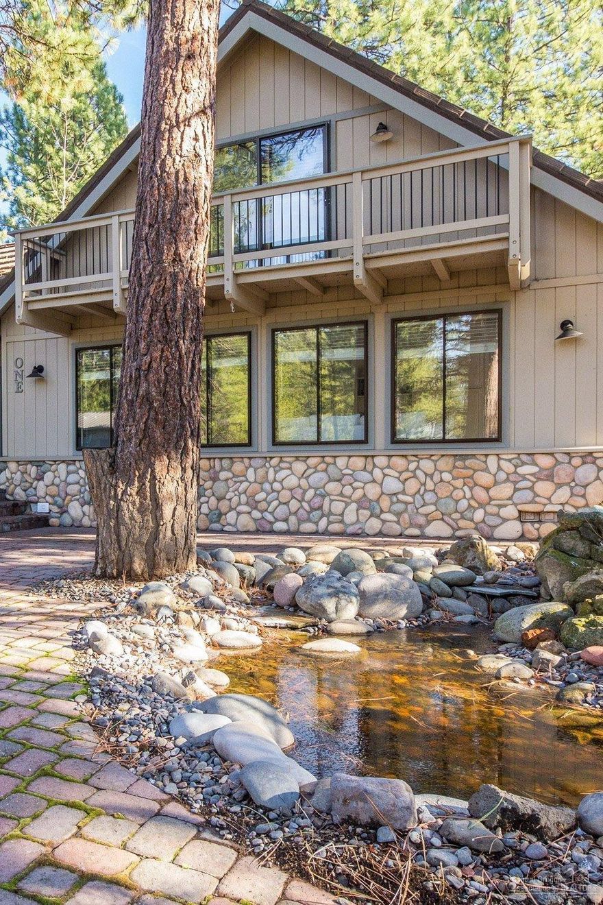 Charming 5 bedroom home is ready for your enjoyment! Close proximity to all Sunriver amenities. Great curb appeal with paver patio in front, custom water feature and landscaping with sprinkler system, Trex on private back deck w/ hot tub. Energy efficient newer metal shake roof, double paned windows. Granite countertops in the kitchen, custom built-in entertainment center in family room. Studio above garage w/ full bath private entry. A-Frame upstairs bdrm w/ viewing decks. Backs to Nat'l Forest. Must see!