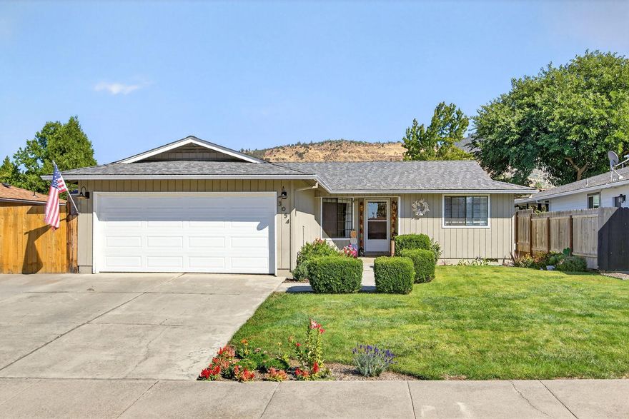 Welcome to this beautifully maintained 4-bedroom, 2-bath home in the heart of East Medford. Thoughtfully designed with both a living room and a spacious bonus room/great room filled with natural light. This home offers plenty of space for gathering and entertaining. The recently landscaped backyard provides a private retreat, perfect for outdoor enjoyment. Nestled in a quiet cul-de-sac, you'll love the convenience of being close to schools, local restaurants, and everyday amenities. Recent updates include a newer roof (2022) and durable luxury vinyl plank flooring throughout, making this home as practical as it is stylish. Don't miss the opportunity to own this rare 4-bedroom home in one of East Medford's most desirable areas—schedule your showing today before it's gone!