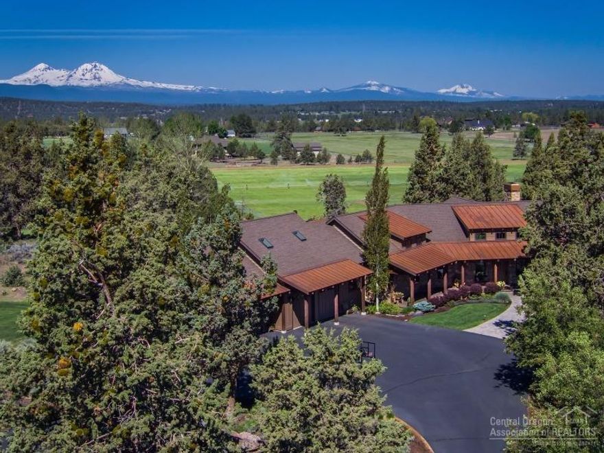 Tumalo NW Style Home on 20 acres with beautiful Cascade Mountain Views. Custom home is 4000 sf, 3 bedroom, 3.5 bathroom, living room with stone fireplace, gourmet kitchen, pantry, family room, office, master suite with a tub, gym/office, 3 car garage and landscaped with pond. The property includes: 16.49 acres of Swalley irrigation water rights with underground sprinkler system, planted in grass pasture, shop with concrete floors, fenced, paved driveway. The setting is private and close to Bend.