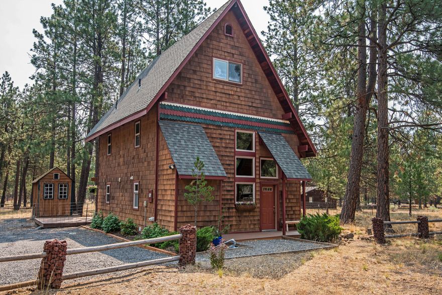 Charming home on nearly an acre of property! A welcoming 2 story entryway, leading to an open concept living/dining/kitchen area, warmed by a pellet stove and Satillo tile floors. Lovingly cared for, this home features 3 bedrooms, 2.5 bathrooms, 1552 sq ft, and has been painstakingly updated. Heated floors in 1st and 2nd floor bathrooms. Newer roof and Milgard triple pane windows. 2 bedrooms and bath on second floor. Third bedroom, 1/2 bath on top floor (possibility of third floor primary). Large porch with a covered portion, container gardens and an upper deck off of the master. Enjoy the Picnic area, Campfire circle, garden shed, access to public lands just out the back gate, fenced on 3 sides. Approved horse property if desired and short term rental possibilities (buyer to confirm).