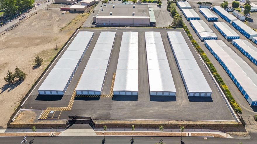 **For Sale: Mini-Storage Investment - 1451 SW Olive St, Madras, OR**
Turnkey 3-acre self-storage facility featuring 51,675 SQFT under roof with 290 total units. Estimated annual income projects a cap rate of 7%+. Property includes a **keypad entry automated gate**, new curbs, sidewalks, privacy fencing, ADA parking, and newly paved street. Self-serve tenant signup system, exterior security lighting, and WiFi connectivity offer modern convenience and low overhead. Located in a prime area with easy access to all parts of Madras. Excellent opportunity for investors seeking strong returns in a growing Central Oregon market.