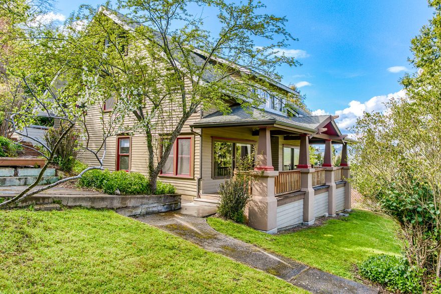 This rejuvenated vintage Craftsman home offers incredible views of the valley and still just a short distance to Ashland's downtown plaza. Built in 1910 with extensive renovations, this home maintains period charm while offering modern comforts and style. A deep porch spans the entire front of the home, providing the perfect place to take in the view or relax with a morning cup of coffee. Moving inside, built-in cabinets and wood floors provide warmth and character. With over 2800 sf of living space, rooms are spacious and provide a sense of space, unique to this era of home. Windows abound allowing for plenty of natural light and the opportunity to enjoy the view
from multiple angles. The updated kitchen with cherry cabinetry, granite counters and gas range are the perfect backdrop for entertaining. With a generous .3 acre lot, there is plenty of room for outdoor living and the separate artist studio rounds out this unique property.